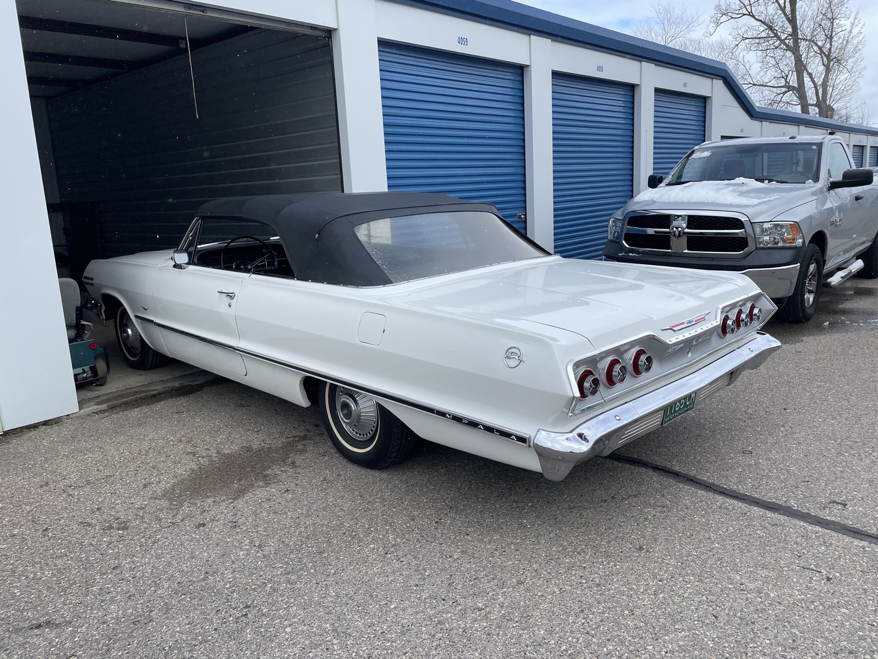 Bright blue vintage Chevrolet in a garage