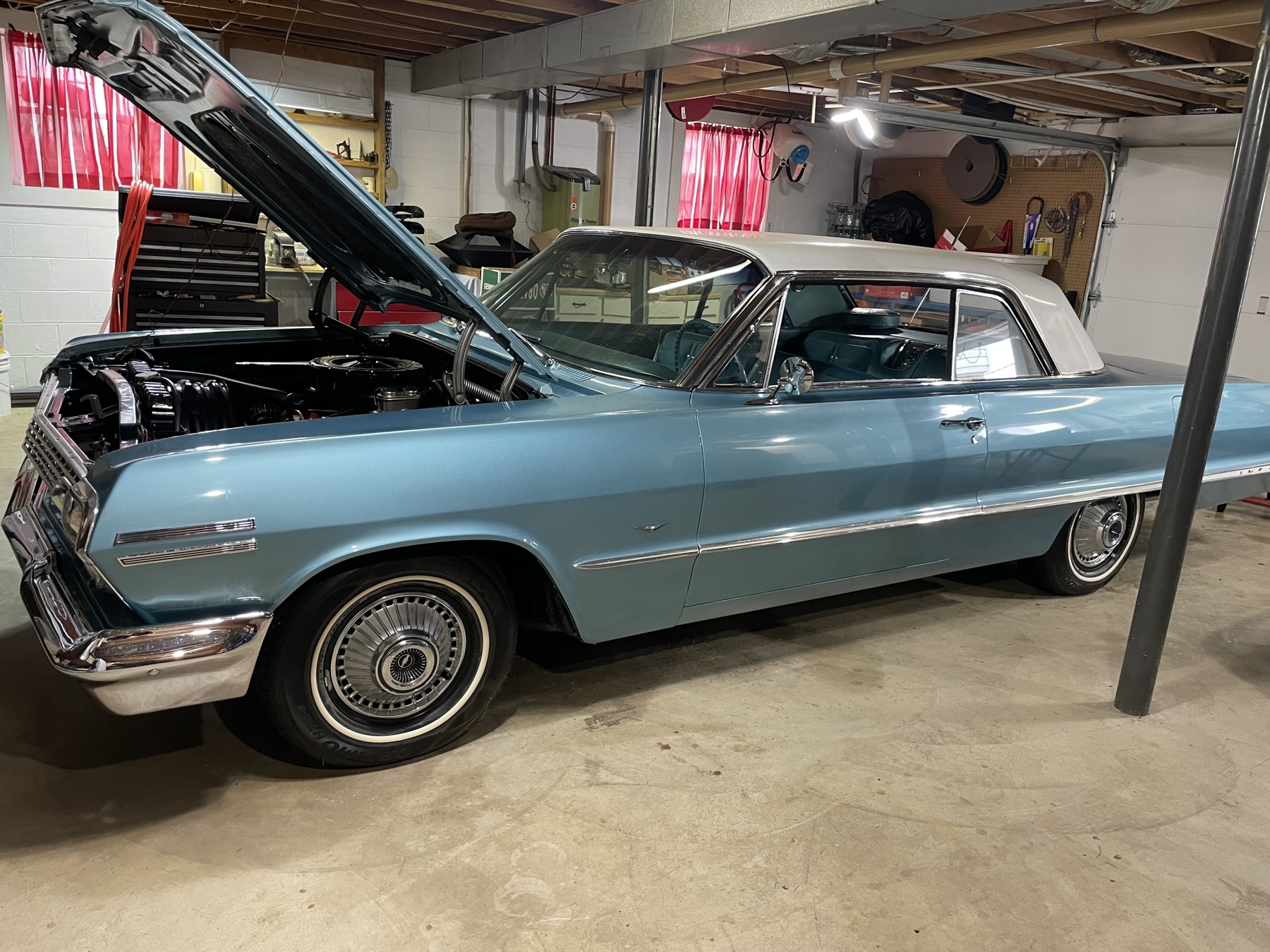 White vintage Chevrolet Impala convertible